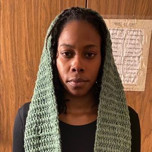 Hand knitted wrap by Lydia Fludd.